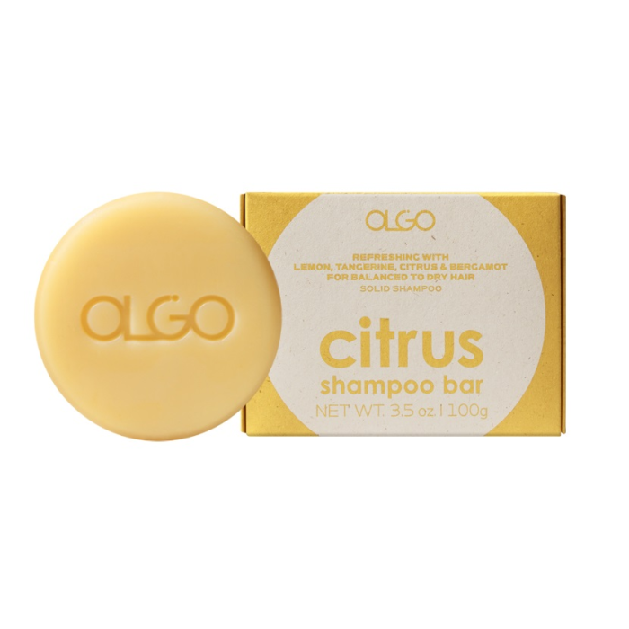 AGLIO Citrus Shampoo Bar. The shampoo bar is yellow with a white label.