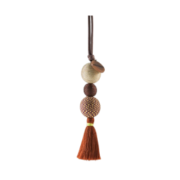 a tassel and wooden beads on a leather strap