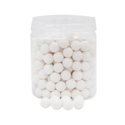 white pills in a glass jar