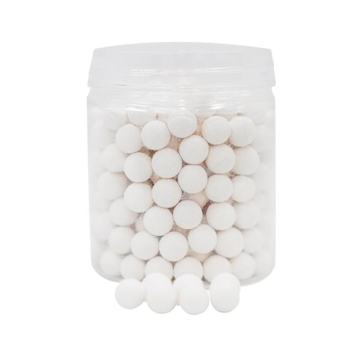 white pills in a glass jar