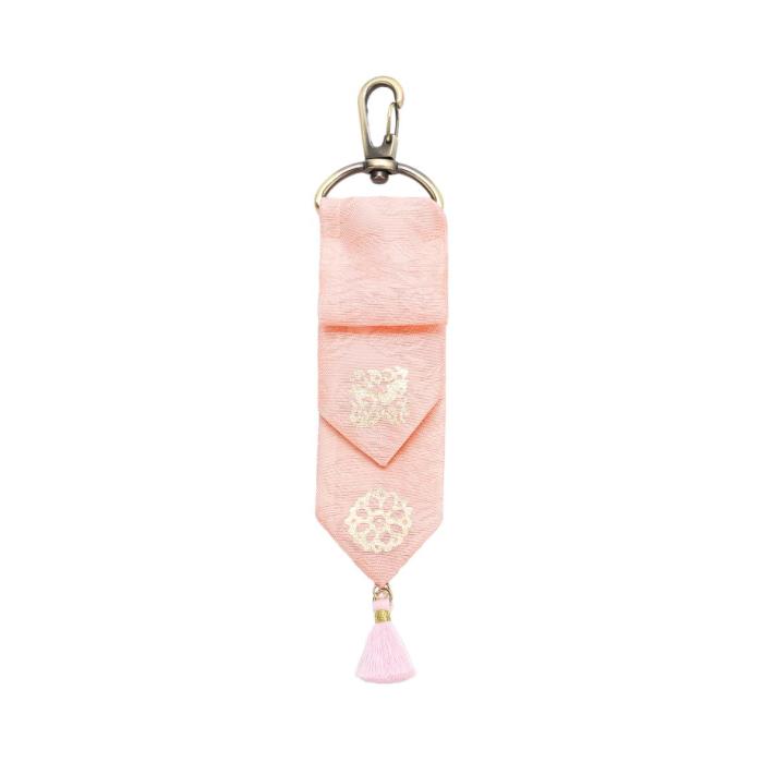 pink lucky bag charm