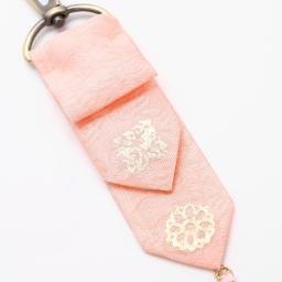 pink lucky bag charm