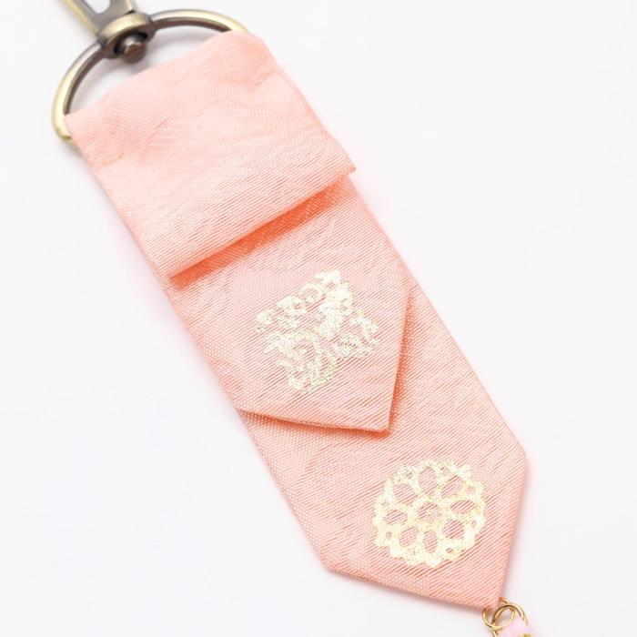 pink lucky bag charm