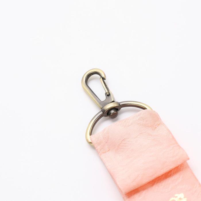 pink lucky bag charm