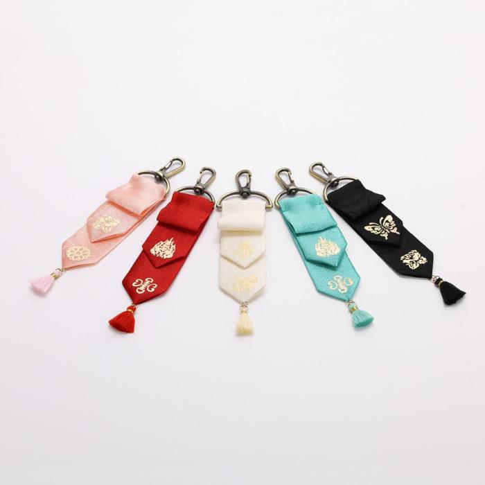 pink lucky bag charm