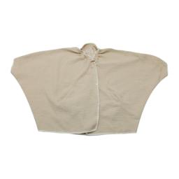 a beige linen shirt with a tie at the waist