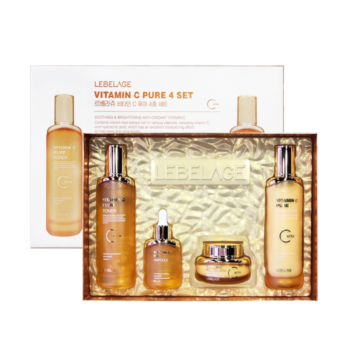 the Le Labo Vitamin C + Pure 4-set, which includes a gold box, a bottle of moisturizer, two bottles of serum, and a jar of face cream