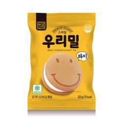 a yellow package of korean cheese crackers with a smiley face on the front