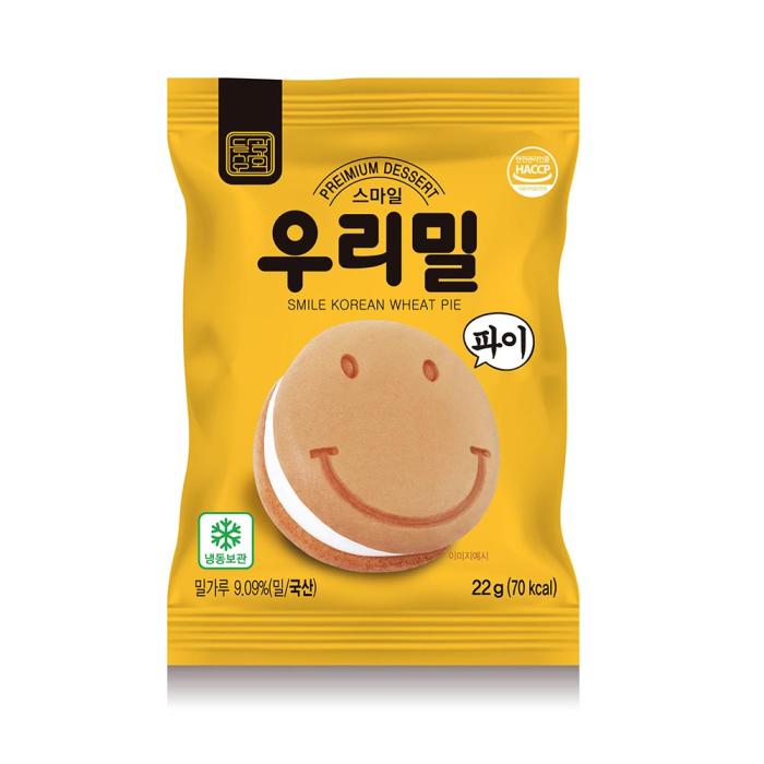 a yellow package of korean cheese crackers with a smiley face on the front