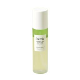 Farmacy Vitamin C Serum in a white frosted glass bottle with a white cap and a green label