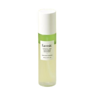 Farmacy Vitamin C Serum in a white frosted glass bottle with a white cap and a green label