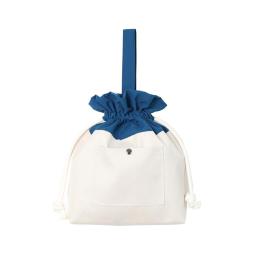 the white and blue sailor bag with a big bow and a handle
