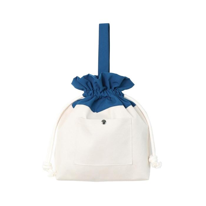 the white and blue sailor bag with a big bow and a handle
