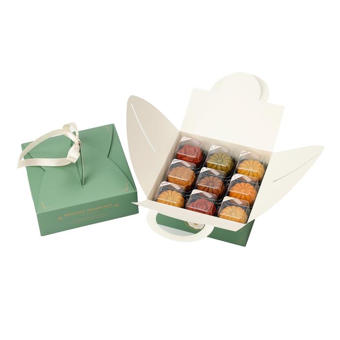the box and the gift box with a ribbon