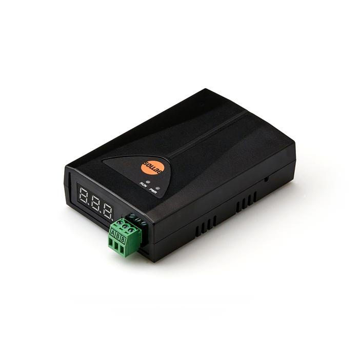a black box with a green USB connector