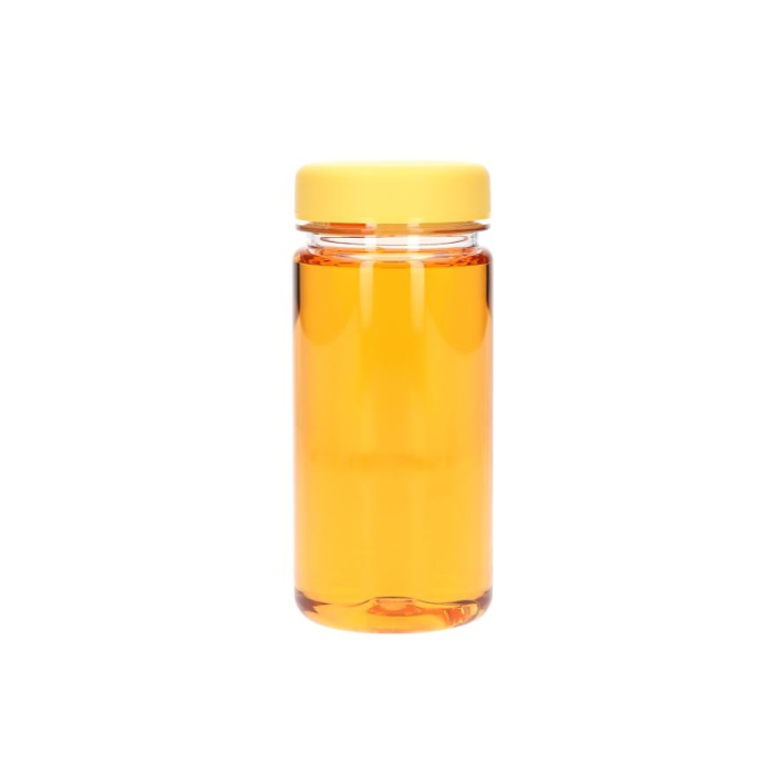 yellow medicine bottle isolated on white background