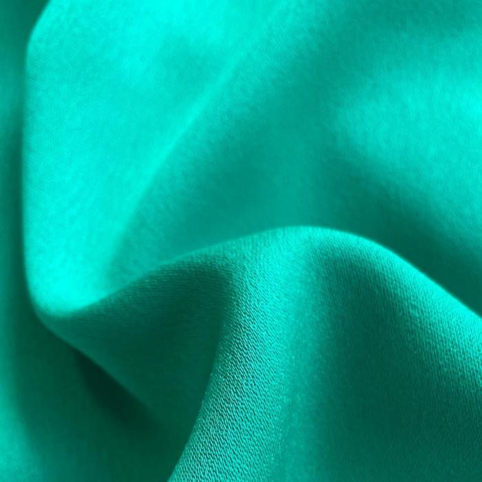 a close-up of a green fabric