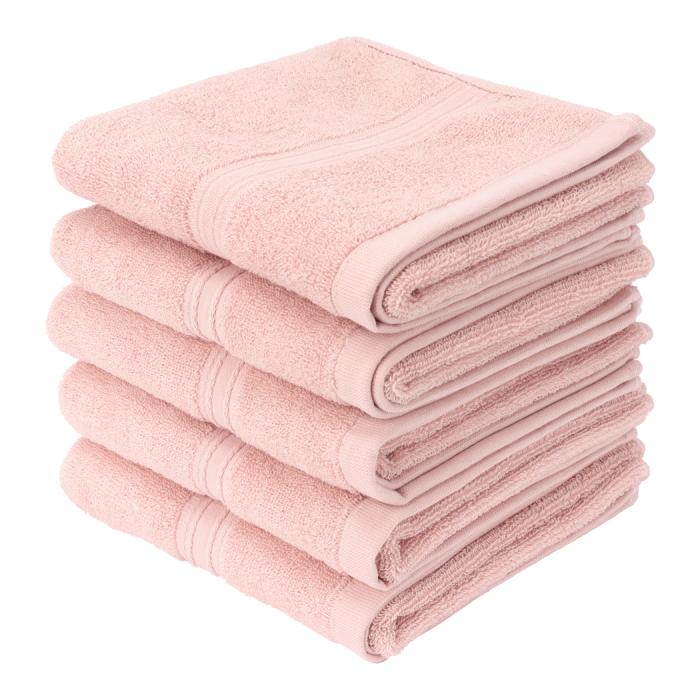 a stack of pink towels on a white background