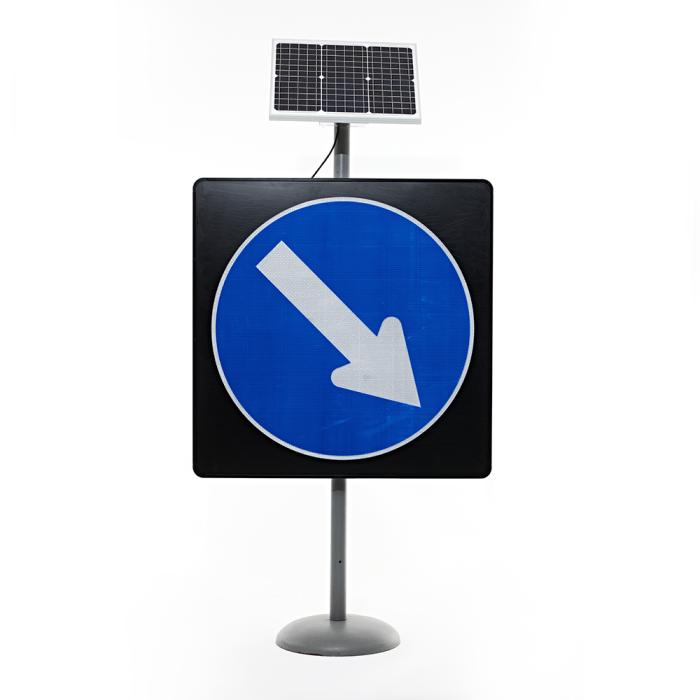 this image stands for: Traffic sign with solar panel on a white background