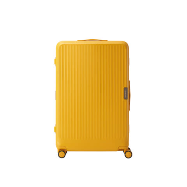 yellow hardside luggage