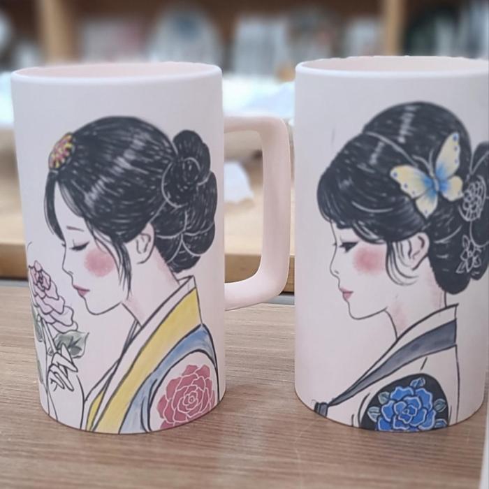 A hand-drawn mug embracing the elegance of Korean tradition.