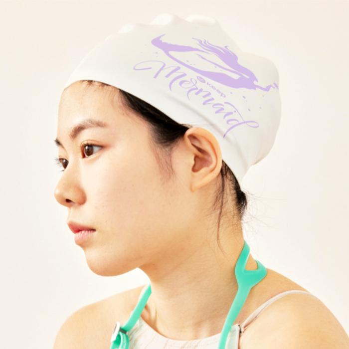 woman wearing swimming cap