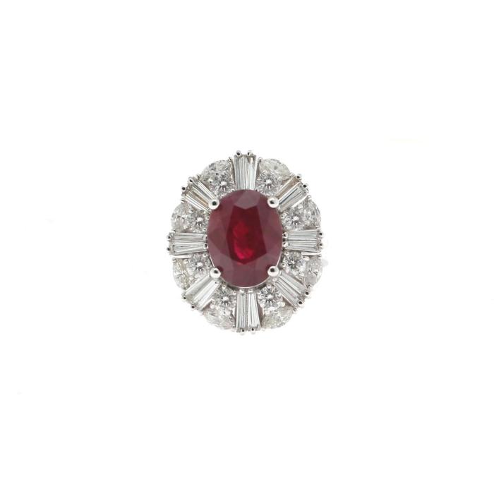 This is a luxurious ring set in 18k gold and diamond ruby.