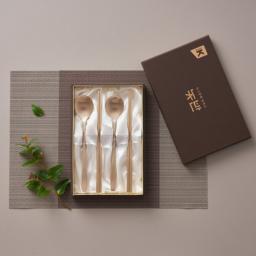 Close-up view of the NOBBAN Bangjja Yugi Bronze 2 Person Spoon Premium Gift Set, emphasizing its fine bronze texture and detailed handcrafted finish.