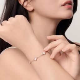 woman wearing diamond bracelet