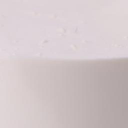 a close up of a white cake