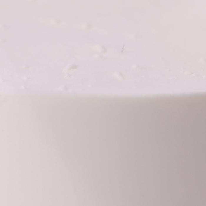 a close up of a white cake