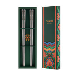 A 2-pair set of glossy silver chopsticks in a box adorned with traditional Korean patterns