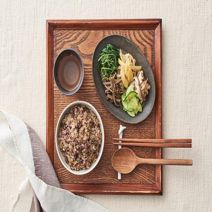 korean meal on a wooden tray