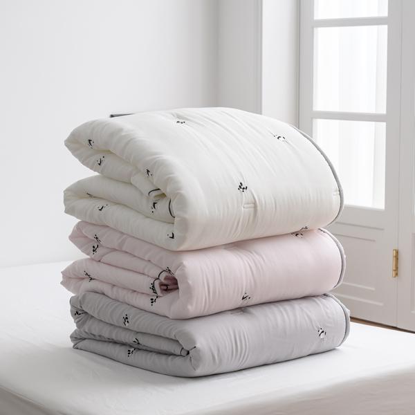 Soft 100% modal fabric with adorable panda embroidery, available in white, pink, and gray.
