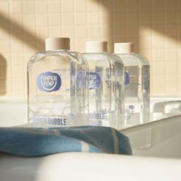 three bottles of bath syrup