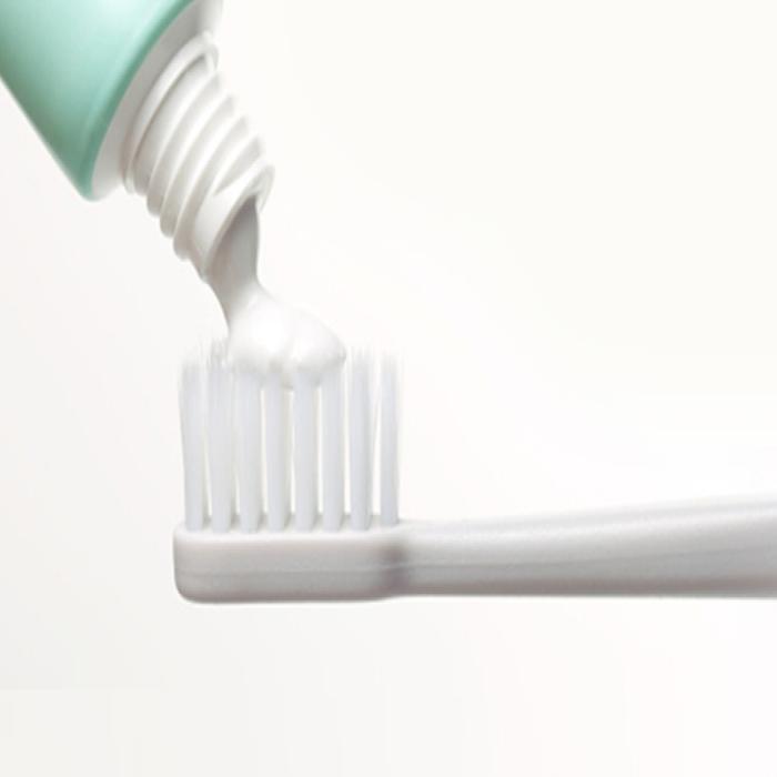toothpaste on a toothbrush