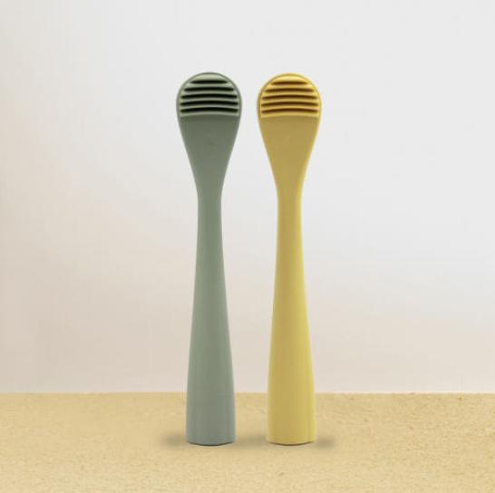 a set of two wooden spoons