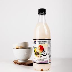 a bottle and a bowl of rice wine
