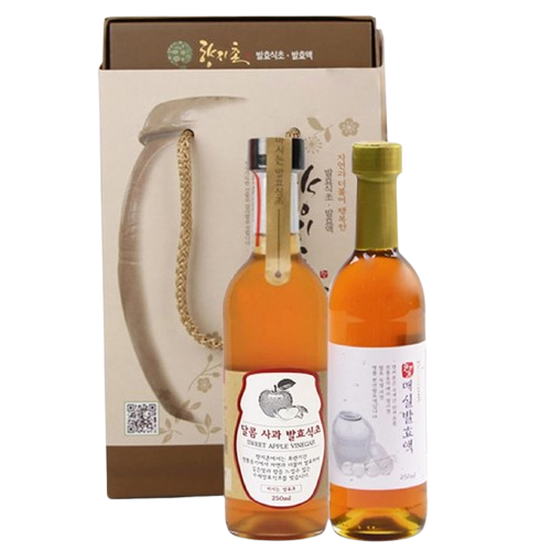 a bottle of wine and a box of sake