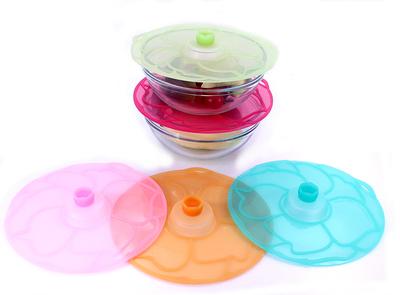 Reusable silicone lid for covering and storing food in bowls, containers, and dishes