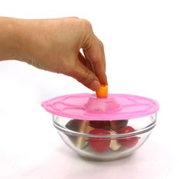Reusable silicone lid for covering and storing food in bowls, containers, and dishes
