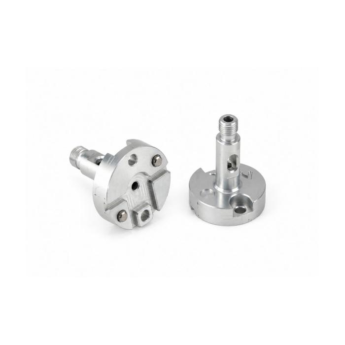 A precision-machined aluminum metal component with a compact cylindrical base and a raised threaded shaft, presented like an industrial hardware part. Its brushed silver finish, clean cutouts, and smooth turned surfaces emphasize engineering accuracy and durability. The visible holes, slots, and layered geometry suggest a functional mounting or connector piece made for exact fit and performance, appealing to technical buyers who value reliability and craftsmanship.